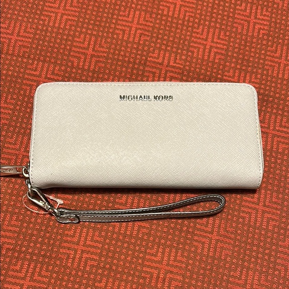 Michael Kors Handbags - Michael Kors White Saffiano Leather Wristlet Clutch